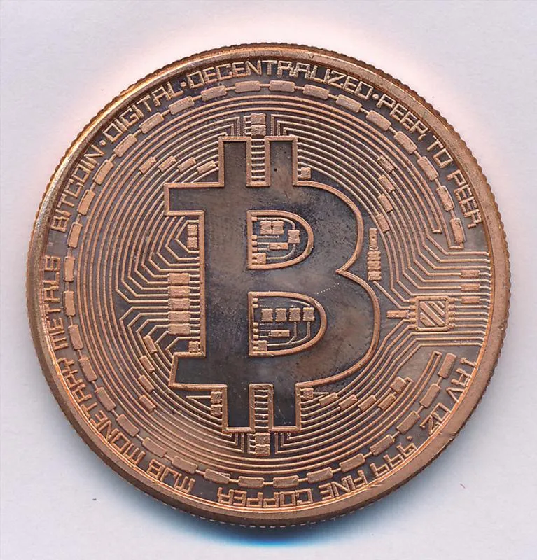 MJB Monetary Metals Bitcoin copper round with circuit-board design and inscriptions BITCOIN DIGITAL DECENTRALIZED PEER TO PEER, 1 AV OZ .999 FINE COPPER and MJB MONETARY METALS.