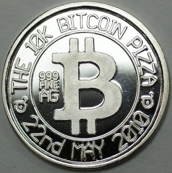 Bitcoin Nerd 1 g silver round with Bitcoin symbol, .999 fine silver marking, THE 10K BITCOIN PIZZA and 22nd MAY 2010 inscription.
